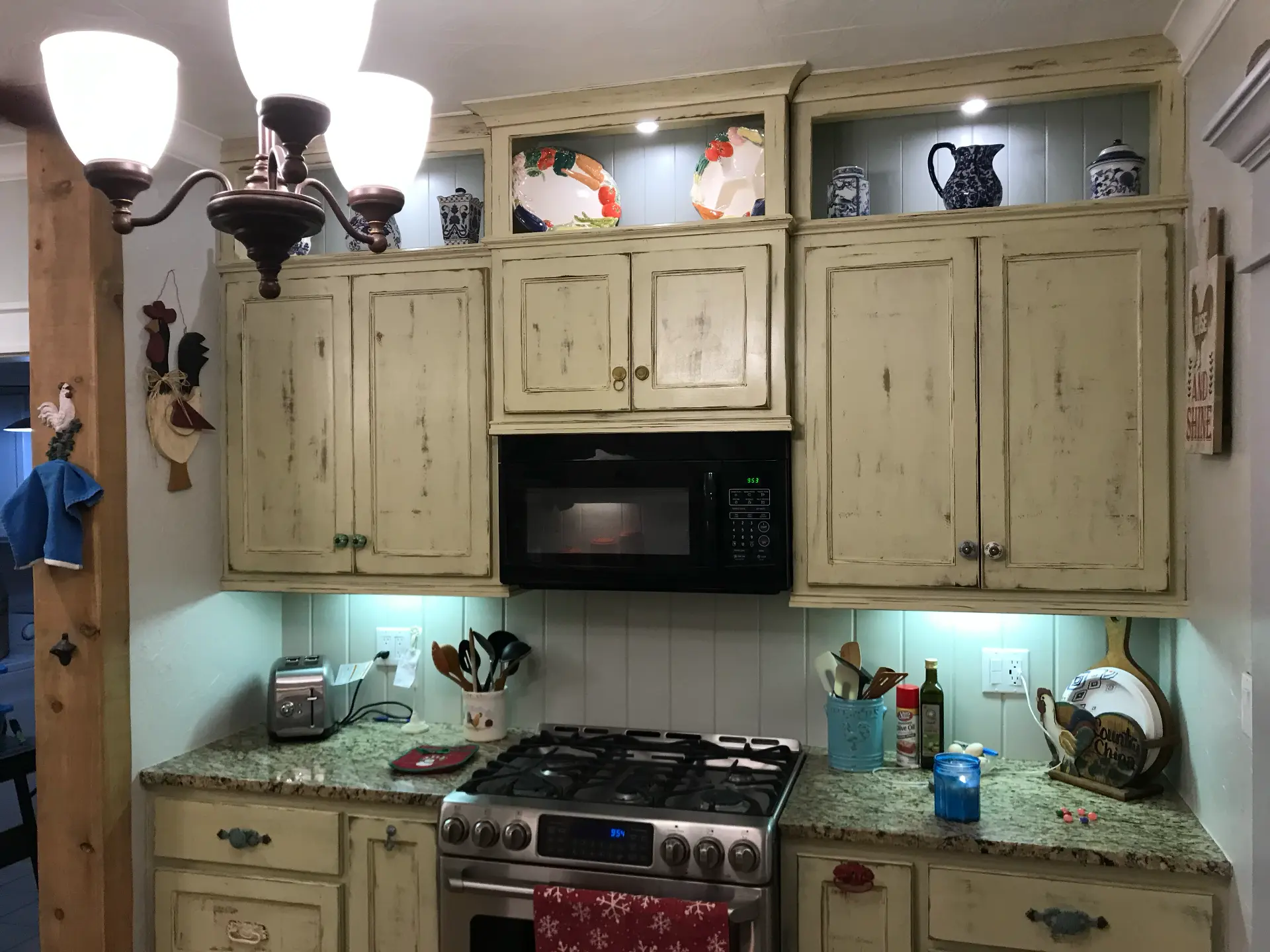 Existing upper cabinets before custom cabinetry remodel
