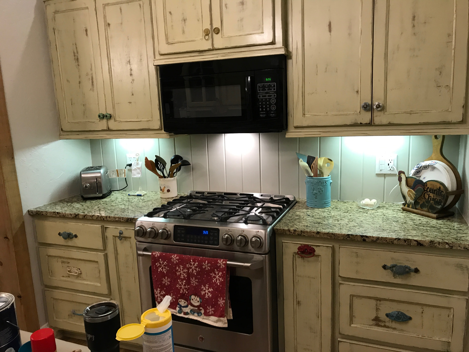Existing kitchen range wall before custom cabinetry remodel